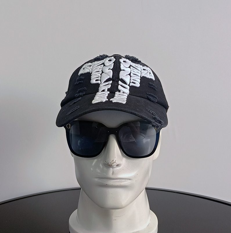 Daewen# washed cap with ripped details and white 3D embroidery