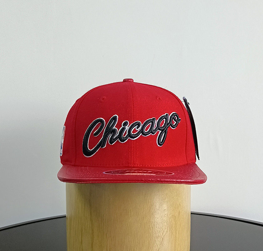 Daewen# snapback cap with faux leather brim and embroidery